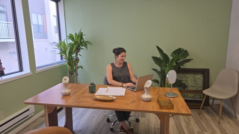 Emilia ruiz MD sitting at her desk